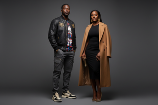 black man in high end streetwear and black women in luxury chic apparel